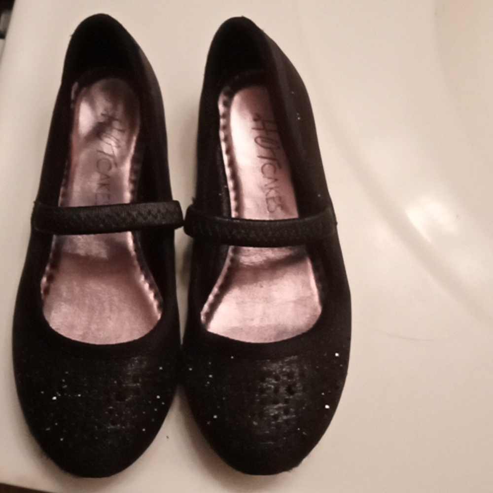Beautiful black slip-on dress shoes size 8 little girls never even been worn.